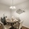 Large dining area with wood floors and access to the living room and kitchen 