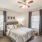 Large bedroom with plush floors and a large window