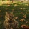 Cat sitting in the grass during fall