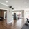 Large fitness center with large windows and plenty of equipment